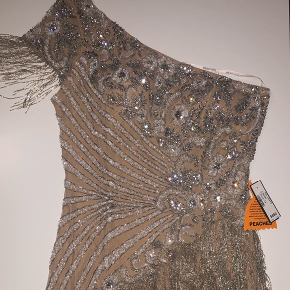 Sherri Hill Dresses & Skirts - A Sherri Hill dress in the color nude and size 14.